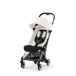 CYBEX Coya Chrome Dark Brown Off White 12 CYBEX Coya Chrome Dark Brown Off White -Günstiges CYBEX || Britax || VOX Geschäft cyb 23 int y045 coya ofwh chbr withoutinlay
